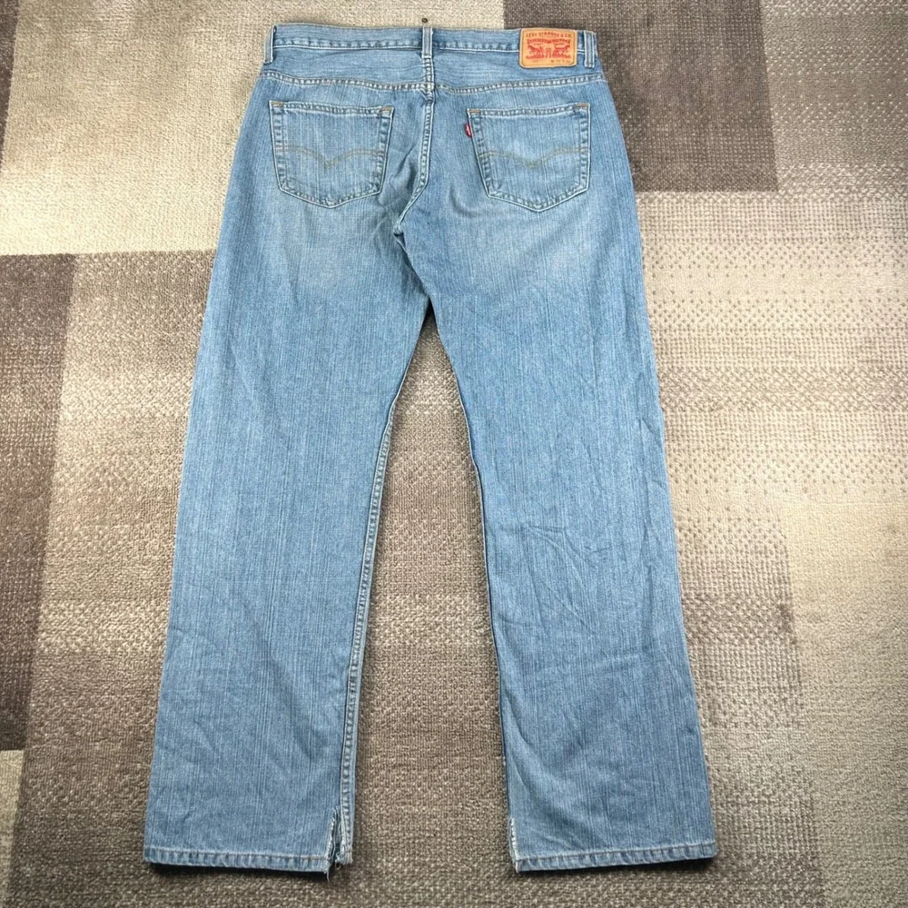 Levis 569 Loose Straight Leg Jeans Mens 34x34 Light Wash Blue Denim Whiskering